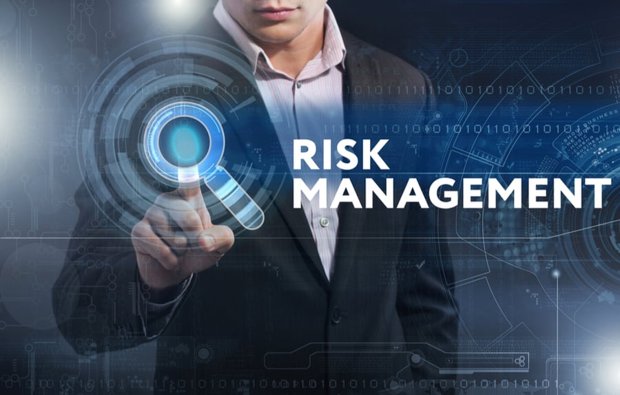 risk management text with a man in the background