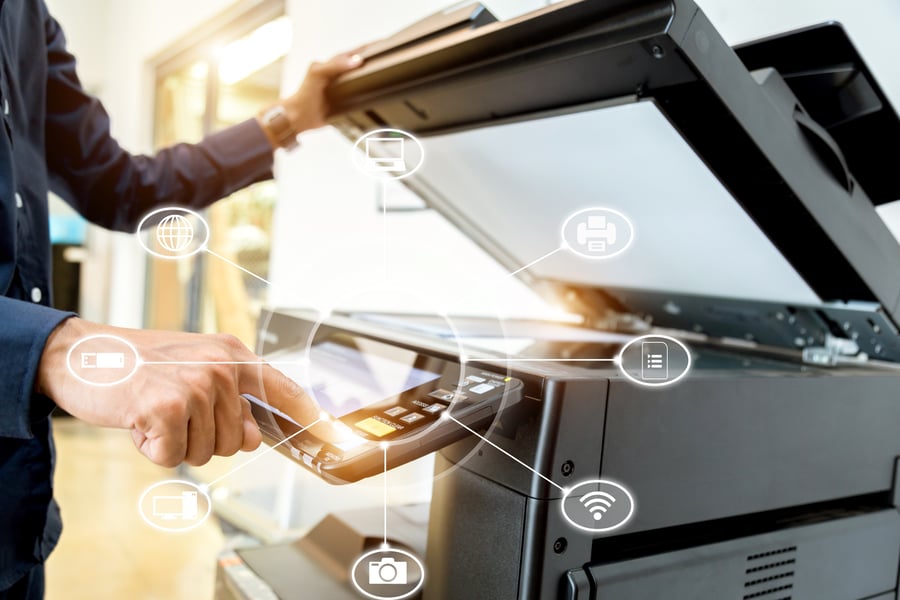 Managed Print Services Man Using Printer Image 