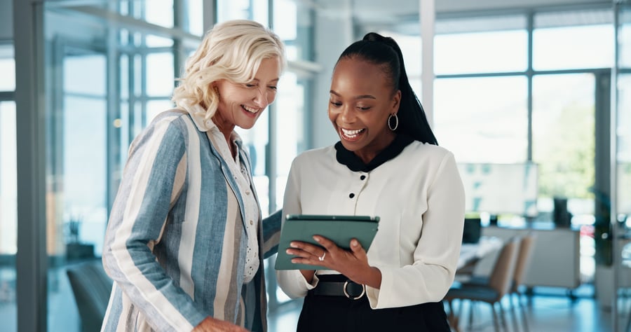 Two women looking at Ipad 